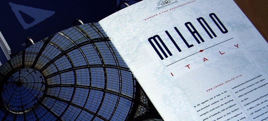 Open spread from the Milan brochure