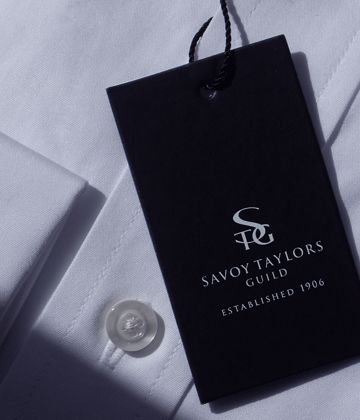 On garment labelling for Savoy Taylors Guild